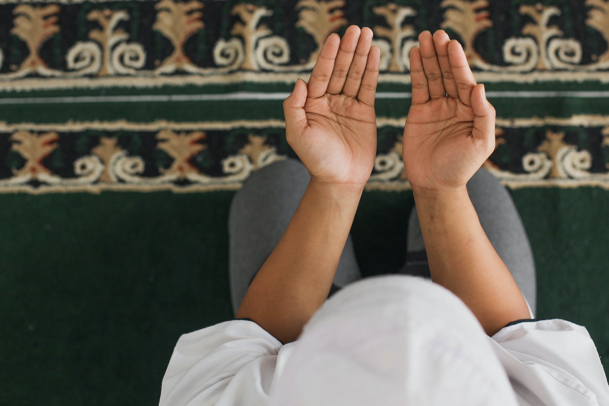 Muslim man hands praying